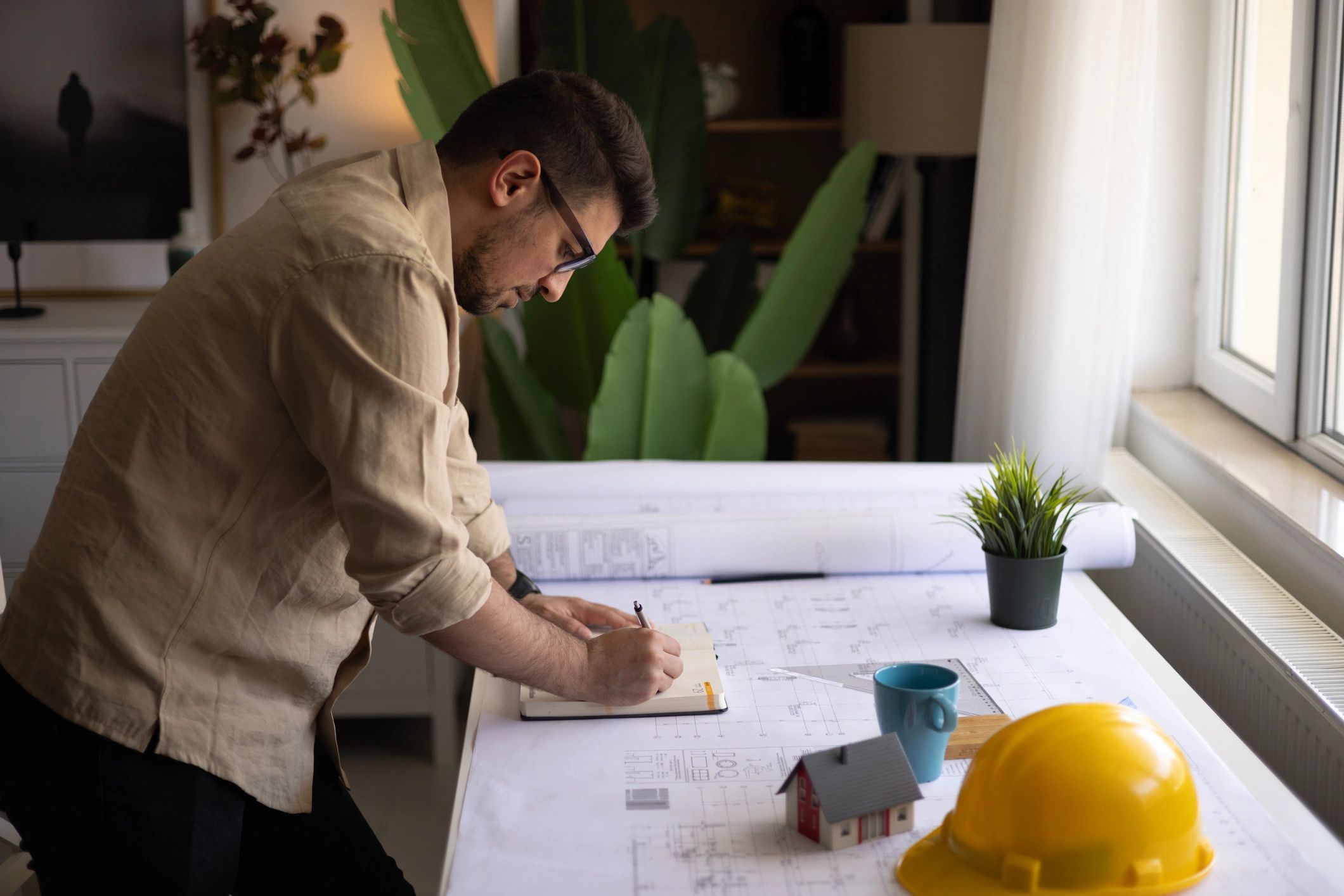 Designer working on cabinetry project planning